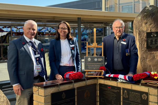 Austin Health Board Chair, Ross Cooke, Chief Executive Officer, Jodie Geissler and Veterans Liaison Officer, Robert Winther at the 2025 ANZAC Day ceremony held in the Remembrance Garden at the Heidelberg Repatriation Hospital.